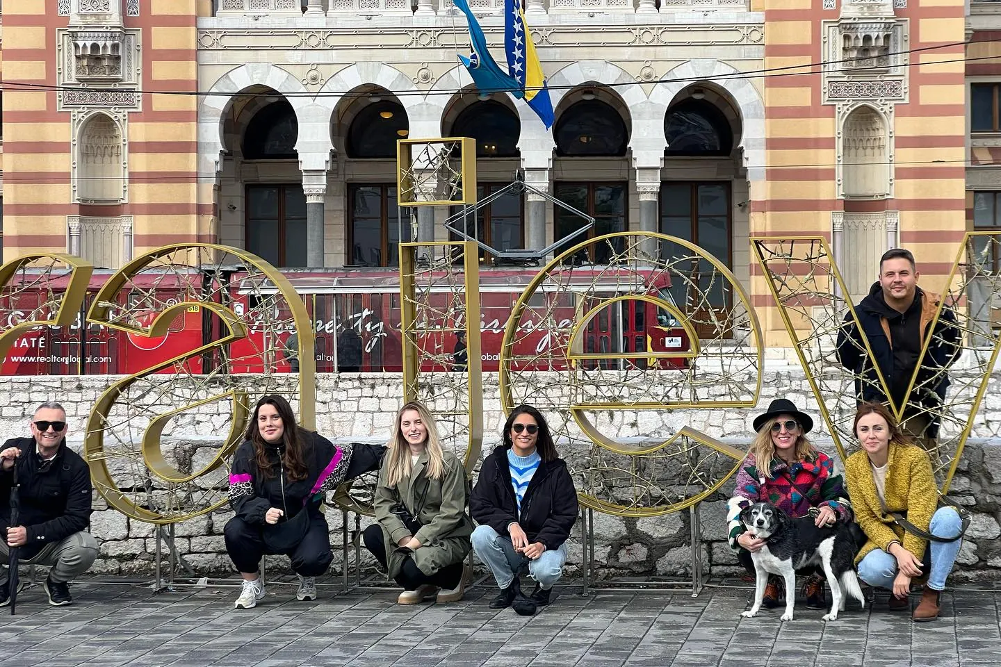 A group of guests outside City Hall in Sarajevo
