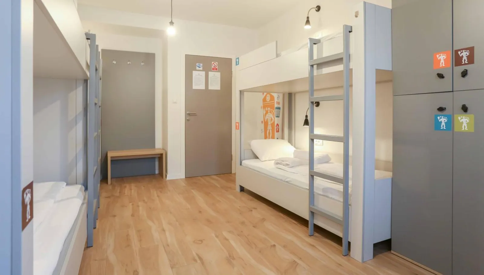 Bunks on both sides of the room and tall lockers