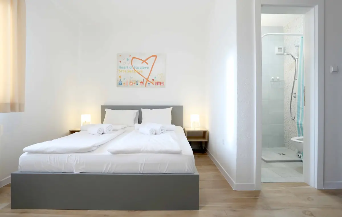 Queen bed and ensuite bathroom