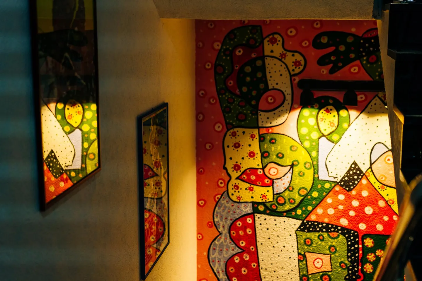 Bright, colourful paintings on our walls